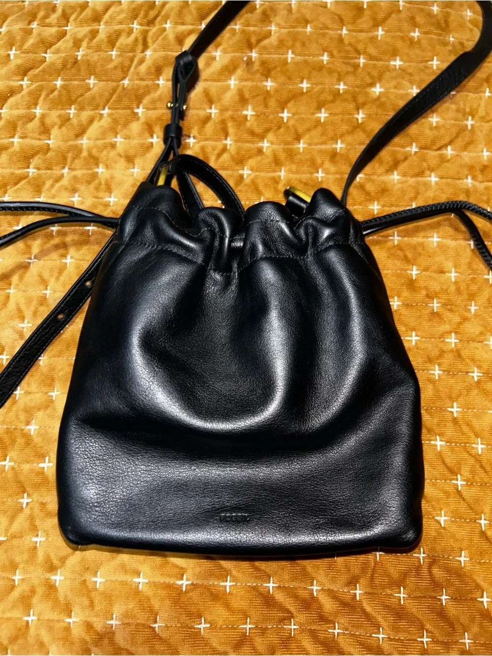 Black leather Fossil drawstring purse
